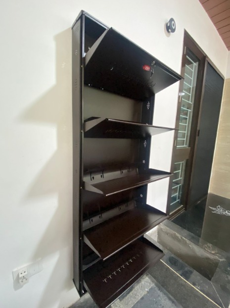 opened metal shoe rack wall mounted