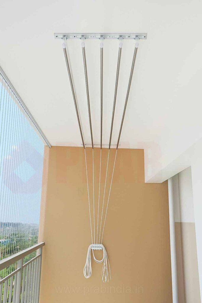 Ceiling clothes drying hanger with man